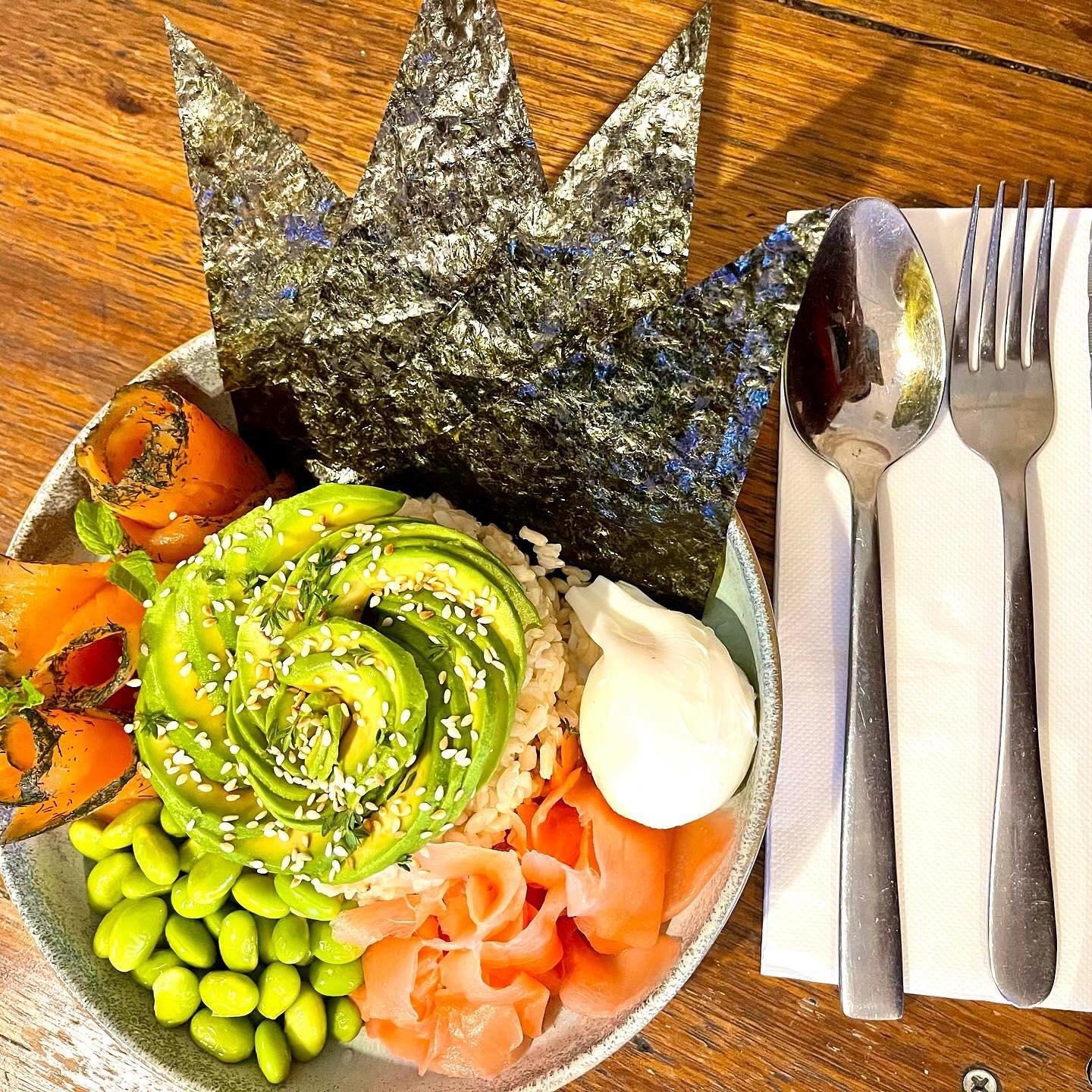 Poke bowl with avocado rose, edamame, cured salmon, pickled ginger and nori